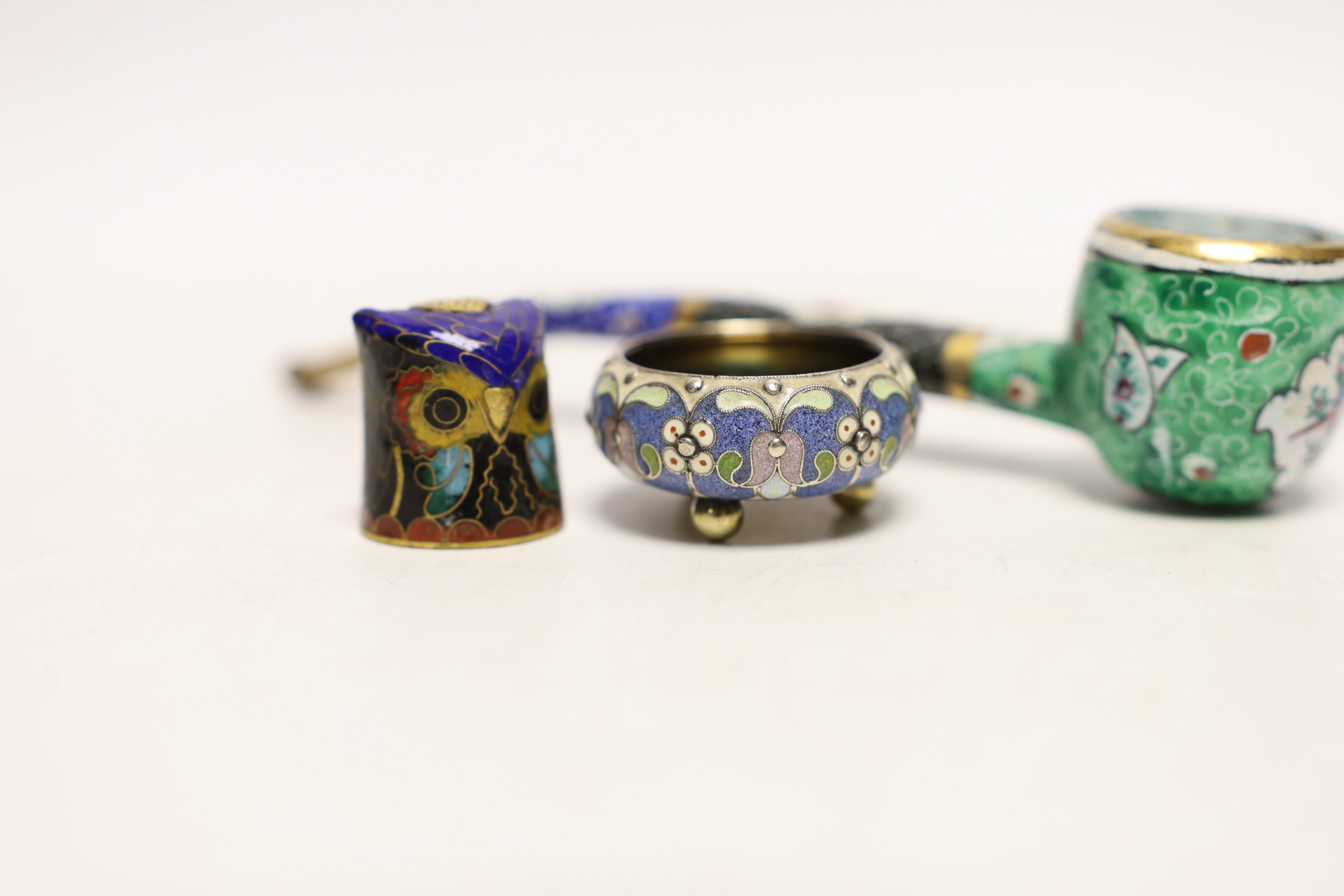 A late 19th/early 20th century Russian 84 zolotnik and cloisonné enamel small salt by Pavel Ovchinnikov, 34mm, together with an enamelled pipe and 'owl' thimble holder.